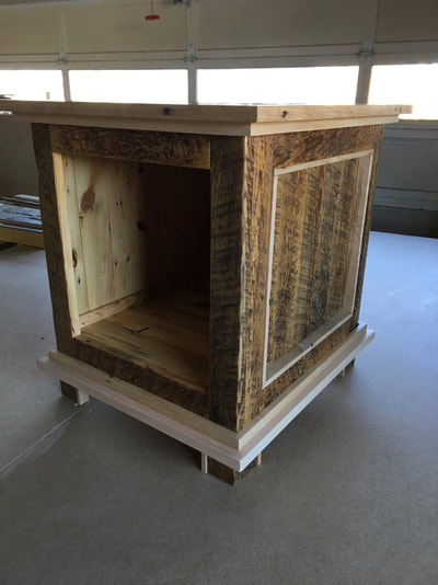 Enclosed on three sides. This modern and rustic end table features reclaimed pine and maple wood. 
