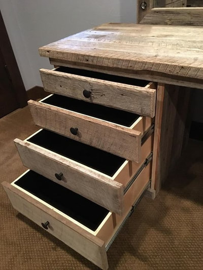 Left side drawer stack of the modern gray reclaimed wood Hollywood vanity. This picture shows the velvet line drawers.