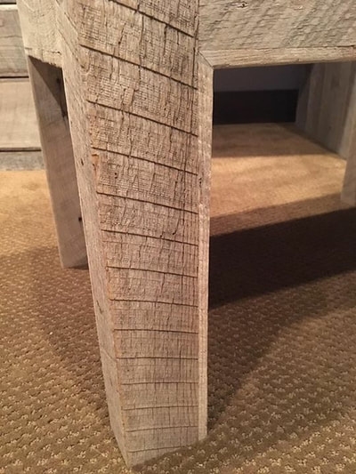Up close picture showing the awesome rough cut charachter of the gray reclaimed wood.