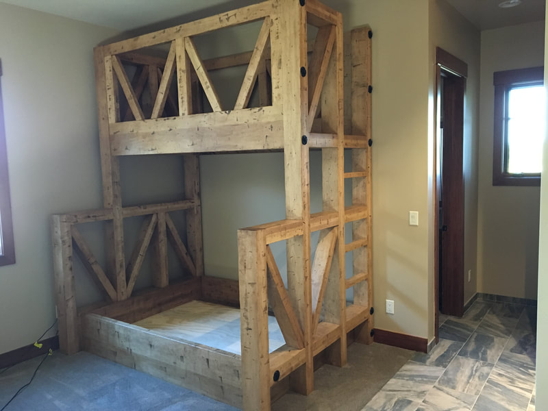 Rustic finished solid maple bunk bed.
