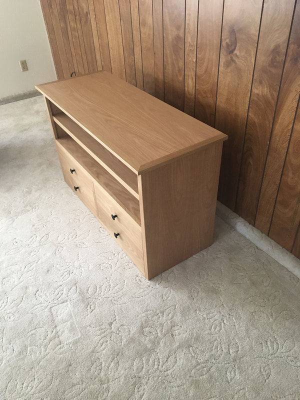 Right side angle view of the white oak entertainment center