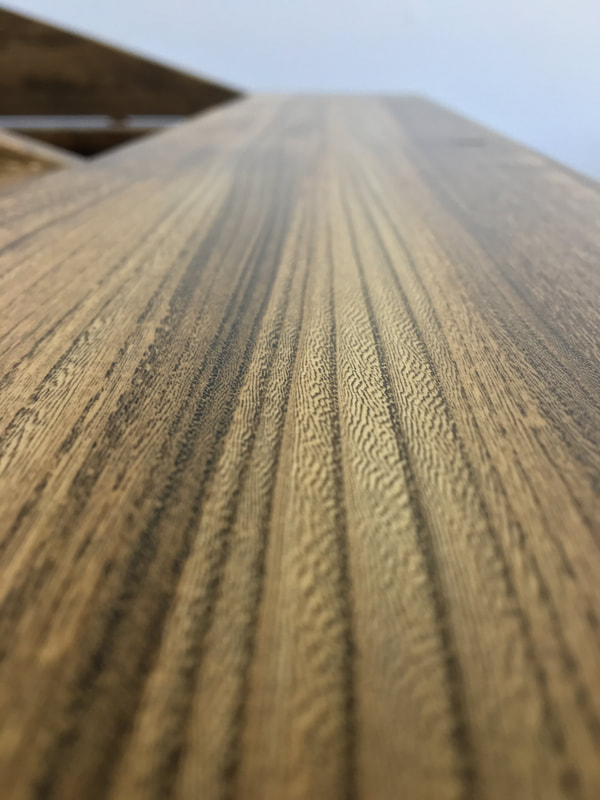 Close up the rift sawn reclaimed white ash wood grain