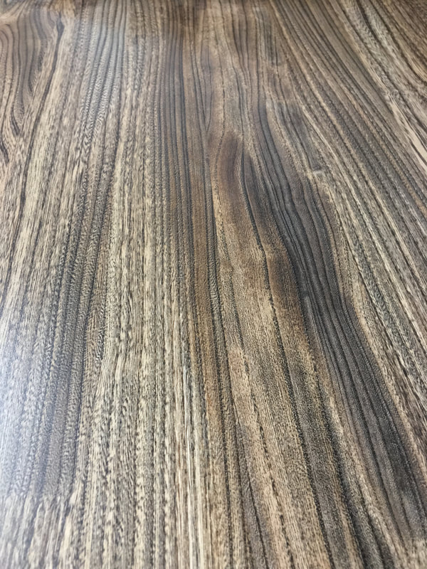 Close up view of the stained reclaimed wood white ash. 